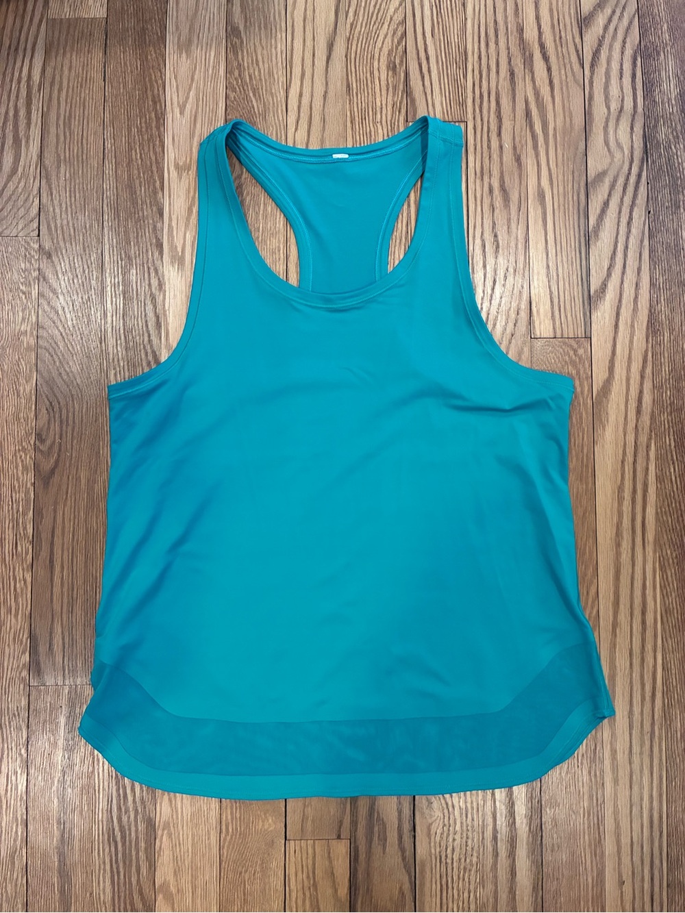 Lululemon Teal Racerback Tank Top with mesh detailed bottom